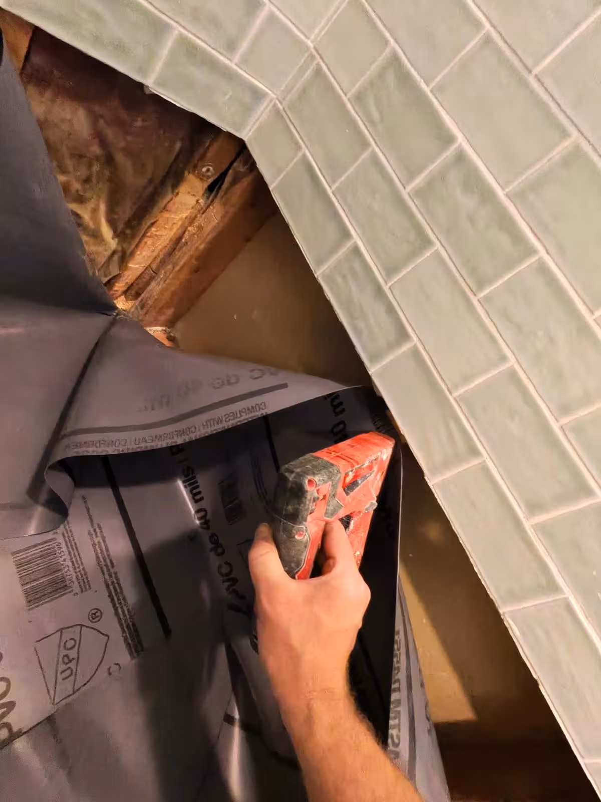 Installing PVC waterproof liner under subway tile wall Denver shower
