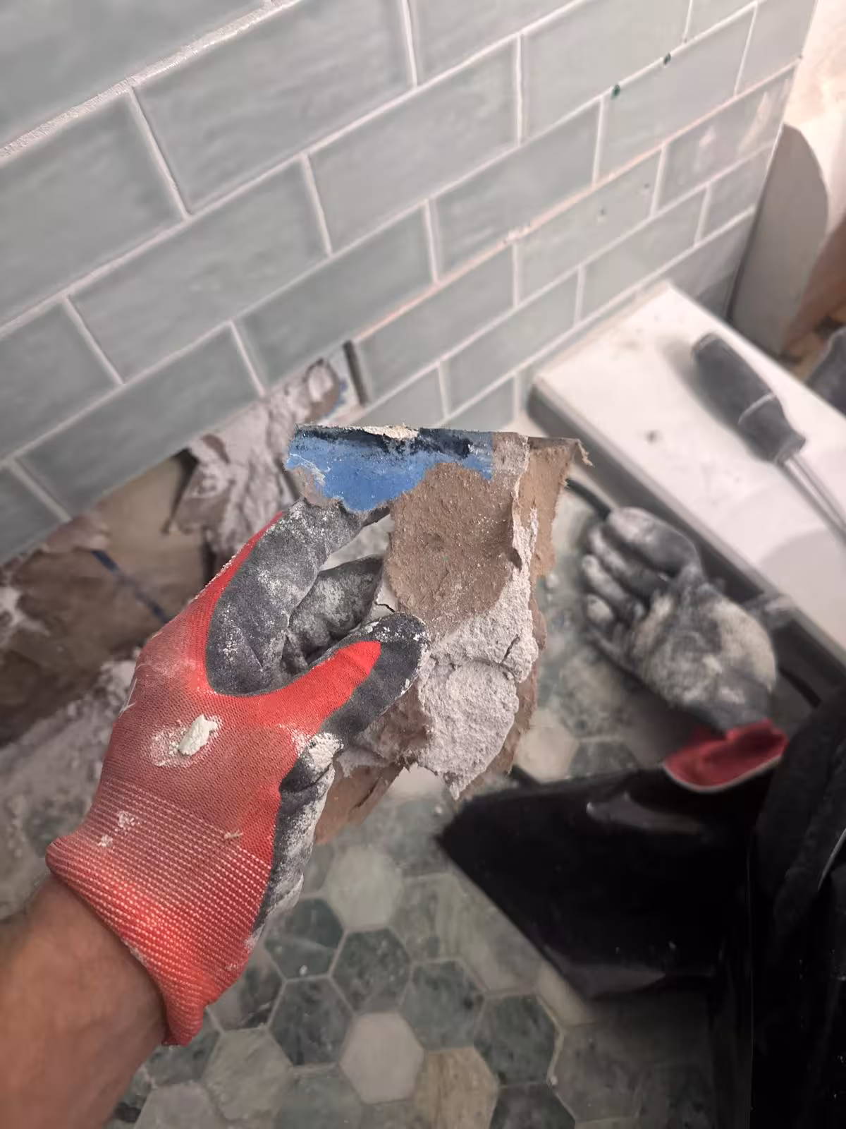 Removing old waterproofing membrane with visible punctures Denver