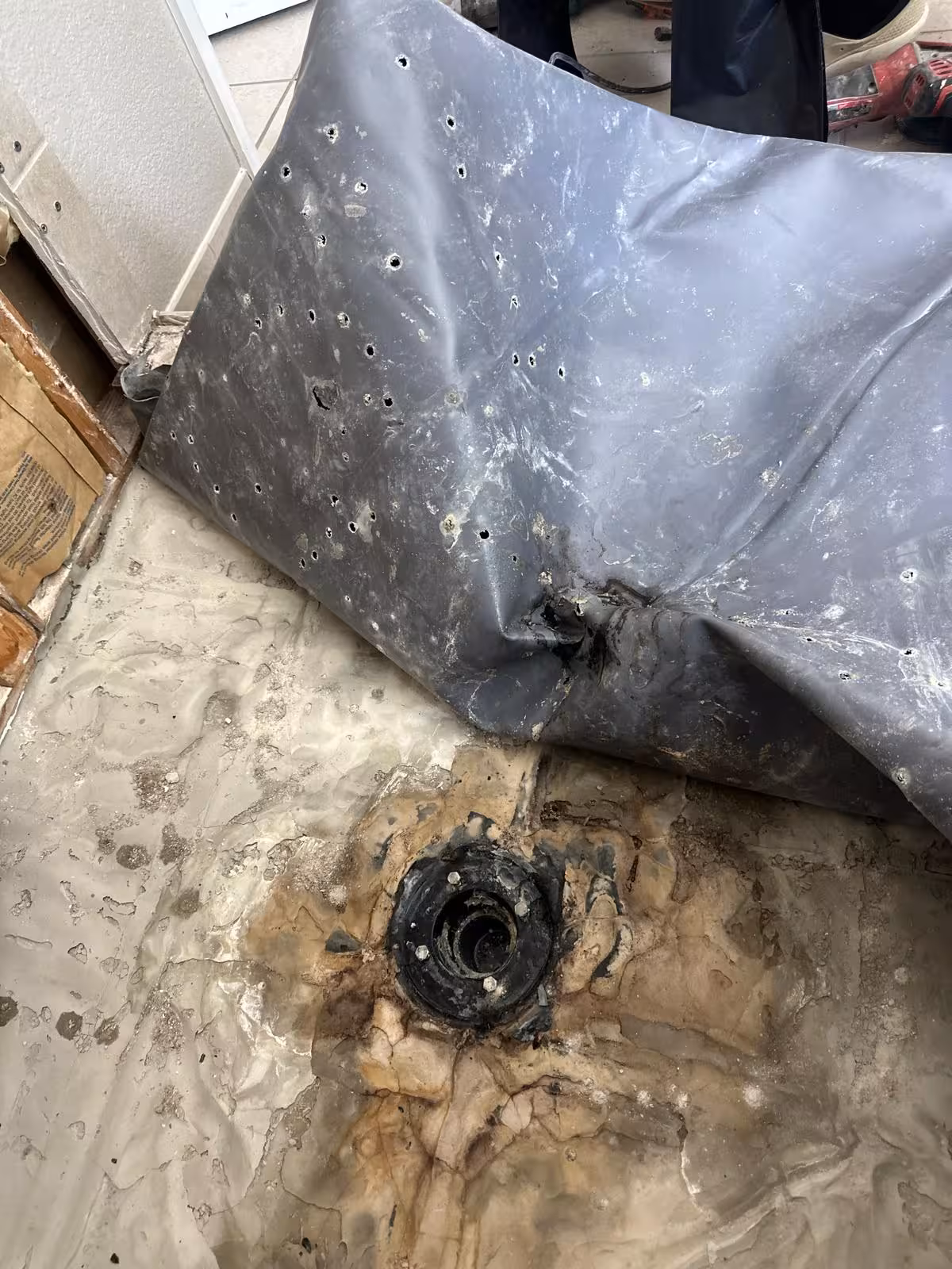 Failed shower membrane removal during DTC pan rebuild