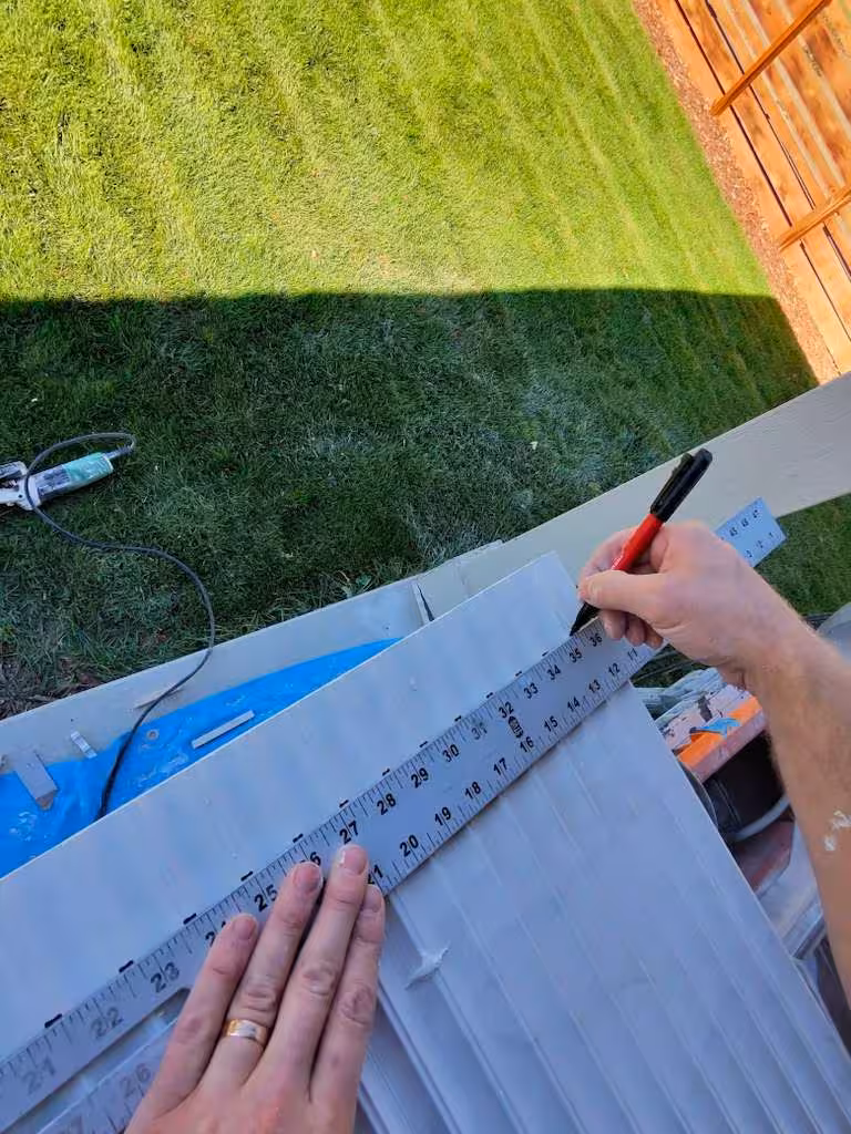 Measuring and marking tile layout for outdoor bathroom installation