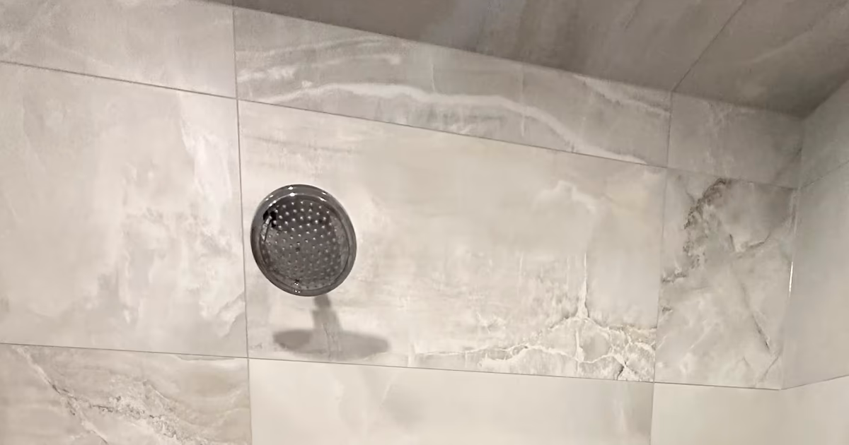 Porcelain vs. Ceramic vs. Natural Stone for Shower Walls: How to Decide