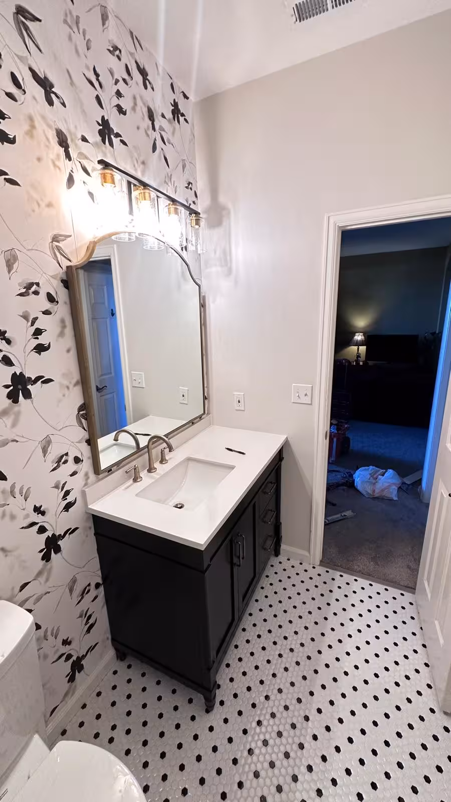 Bathroom wall tile and mosaic detail showing designer accent pattern Arvada Colorado