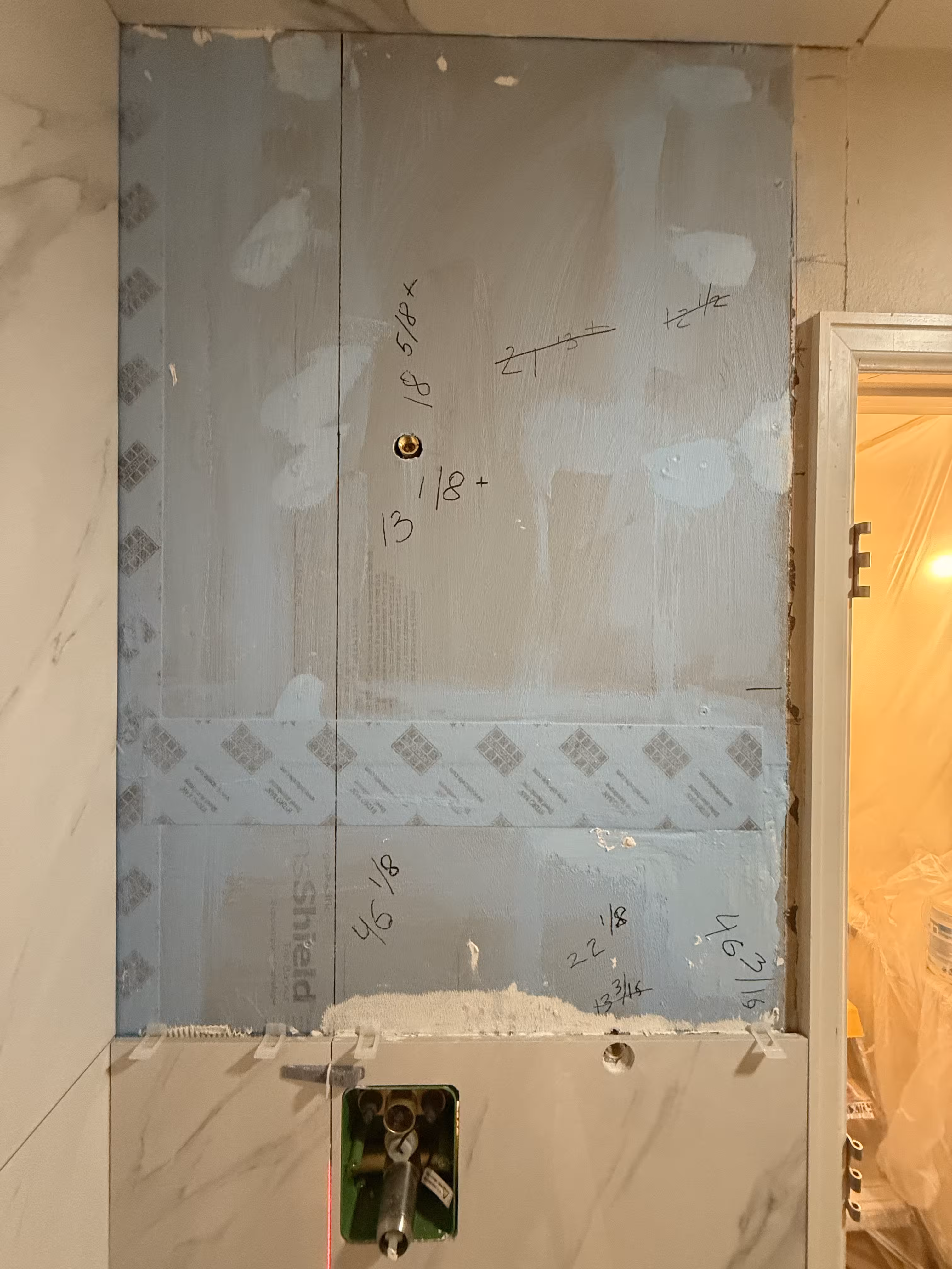 DensShield shower wall preparation with reinforced seams for waterproof shower remodel