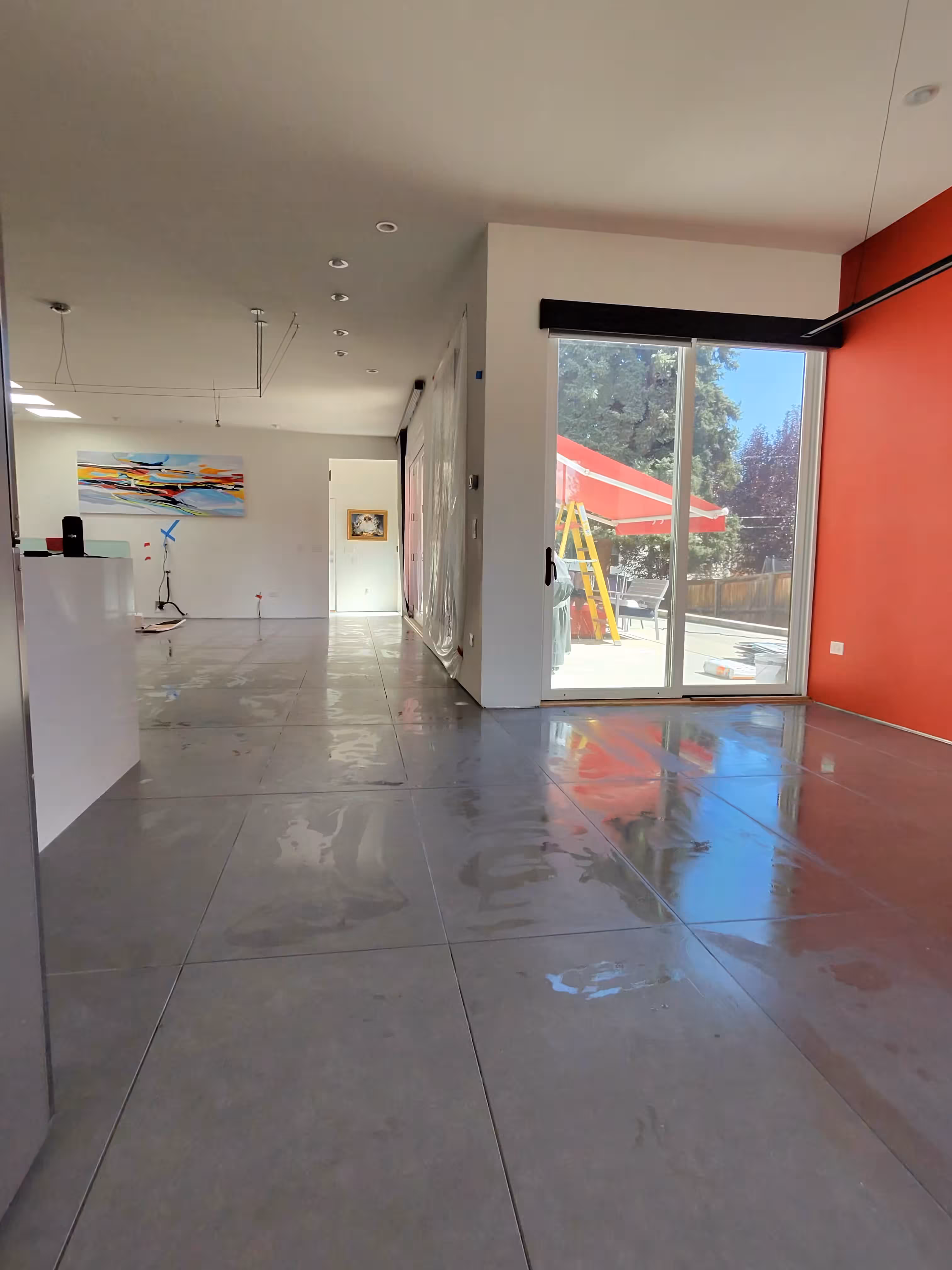Completed large-format porcelain floor - 1,280 square feet