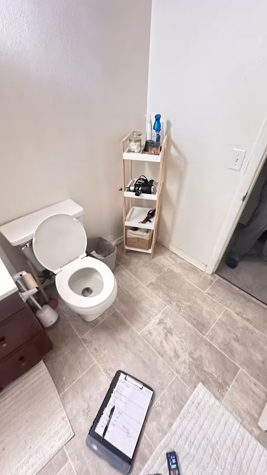Basement bathroom before remodel showing outdated bathtub and dated fixtures in Aurora Colorado home