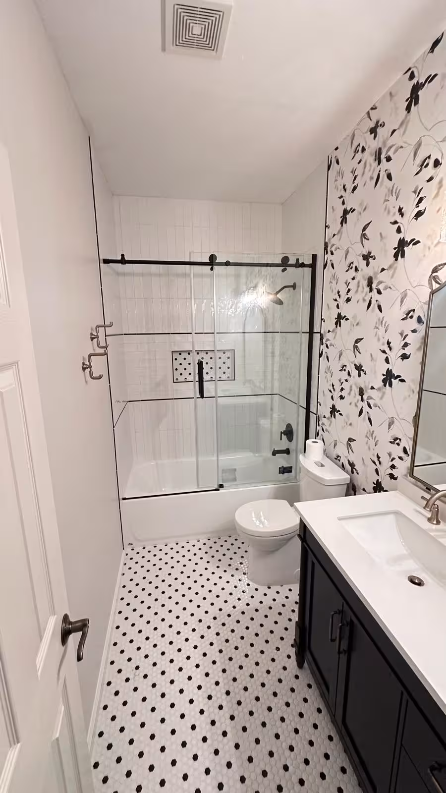 Mosaic tile pattern installation during Arvada bathroom remodeling project