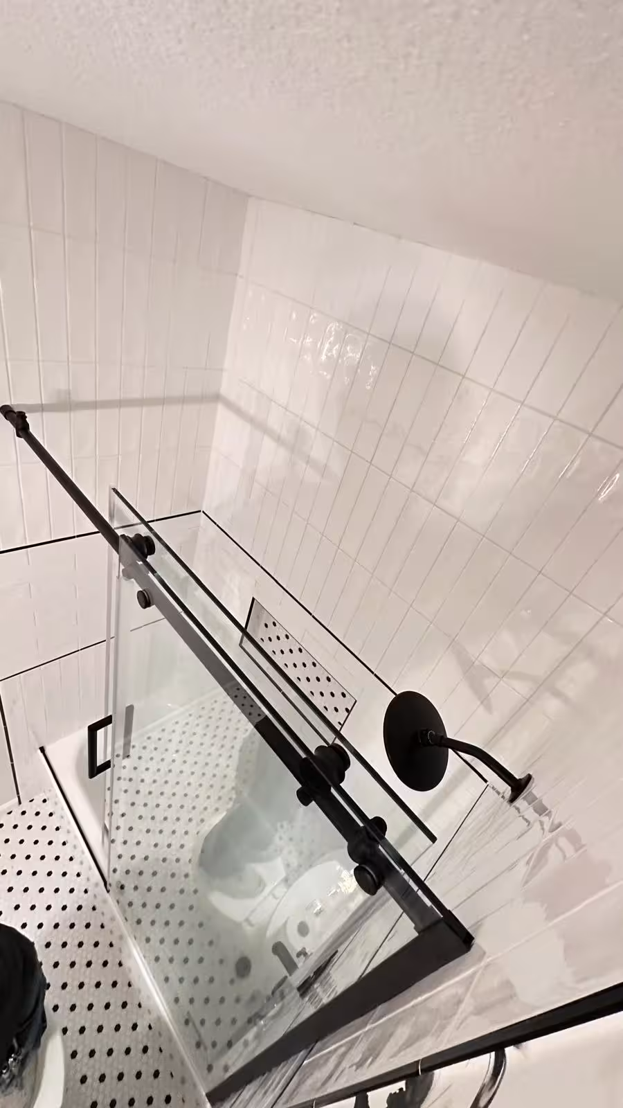 Custom soap niche tile installation with mosaic finish Arvada designer bathroom