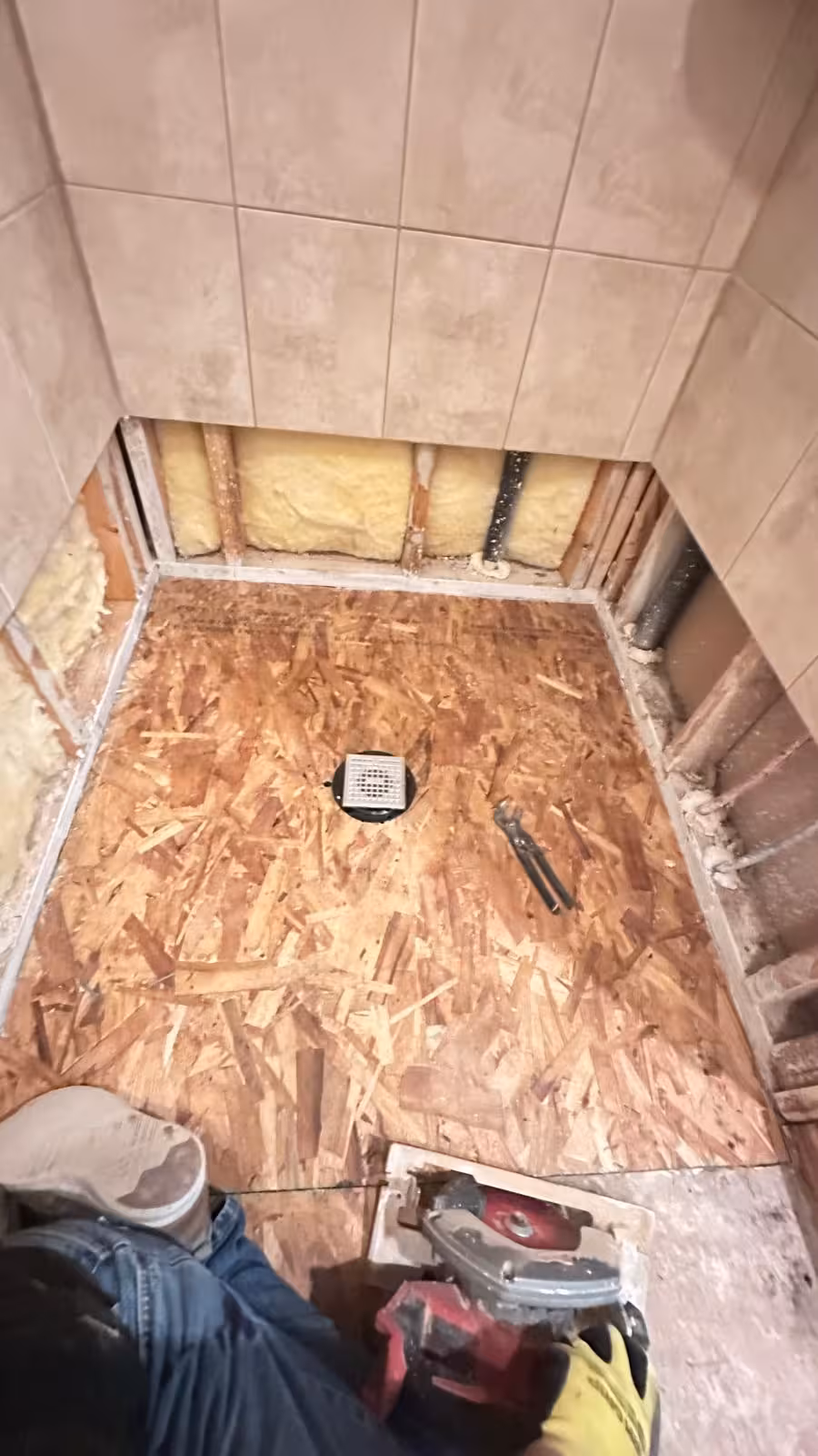 Shower base rebuild with new OSB subflooring replacing rotted plywood Elizabeth Colorado