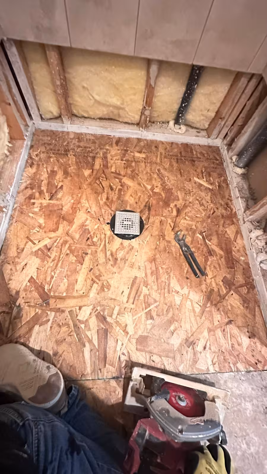 New OSB subfloor installation during shower pan reconstruction Elizabeth Colorado repair