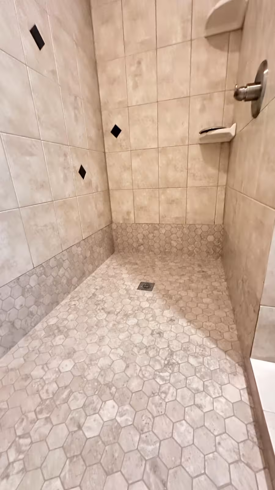 Panoramic view of completed shower pan repair and tile installation Elizabeth Colorado